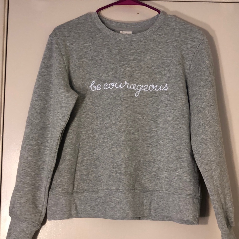 Gray sweater, “be courageous”